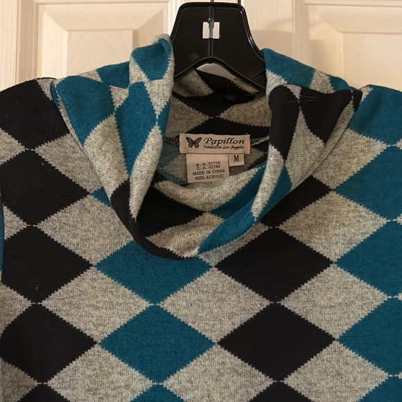 Papillion sweater dress. Slightly fitted mini dress. - Picture 2 of 4